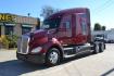 2017 MAROON KENWORTH T680 with an PACCAR MX13 12.9L 455HP engine, ULTRASHIFT 10SPD AUTOMATIC transmission, located at 9172 North Fwy, Houston, TX, 77037, (713) 910-6868, 29.887470, -95.411903 - 76" RAISED ROOF SLEEPER, DOUBLE BUNK, DUAL 135 GALLON FUEL TANKS, WB: 230", RATIO: 3.36, ALUMINUM WHEELS, BUILT-IN NAVIGATION, CRUISE CONTROL, POWER WINDOWS, LOCKS, & MIRRORS, ENGINE BRAKE, 53,200LB GVWR - Photo#0